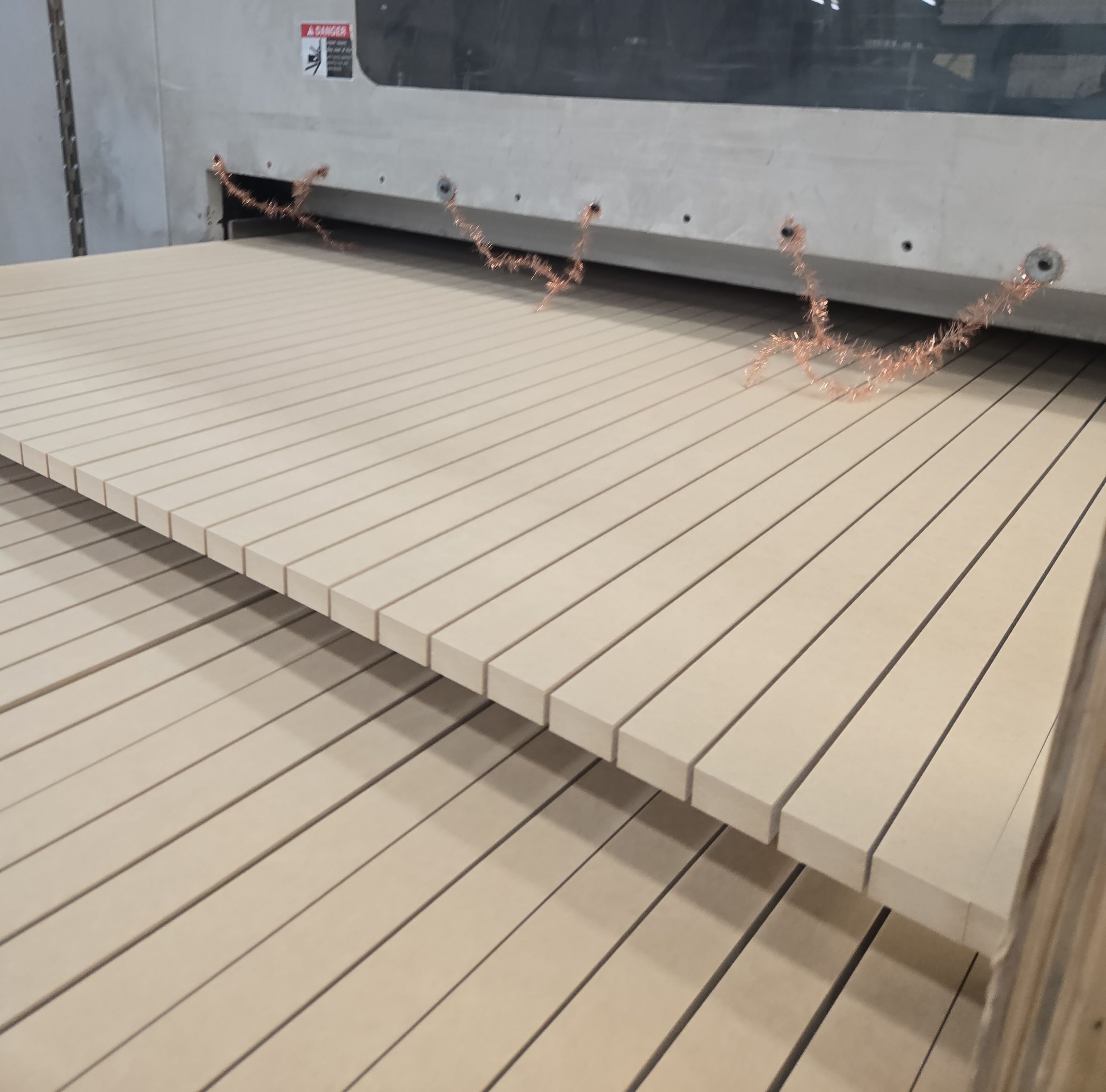 Boards as slit down to strips through our gang saw.